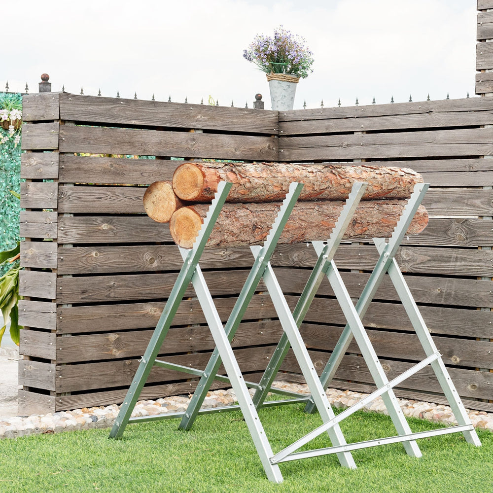 Heavy duty portable foldable steel sawhorse supporting logs, featuring a stable triangular structure for efficient use.