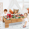 Double-sided wooden train set table with 100 pieces, featuring storage drawer, for imaginative play and creativity.