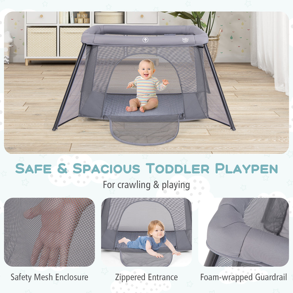 Portable baby playpen in dark gray with safety mesh enclosure and zippered entrance, ideal for crawling and playing.