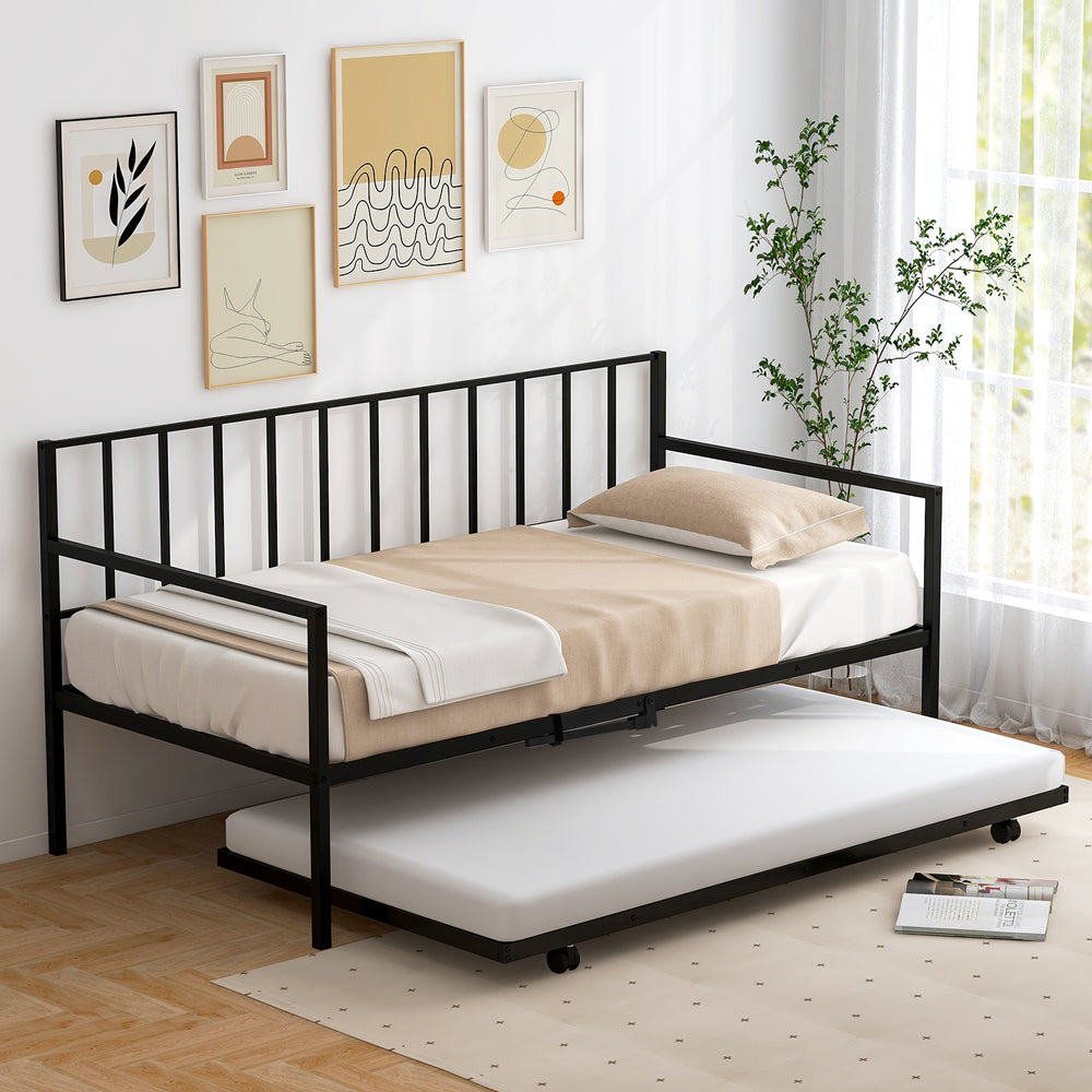 Twin size daybed and trundle frame in black with a mattress, ideal for living room or guest room use.