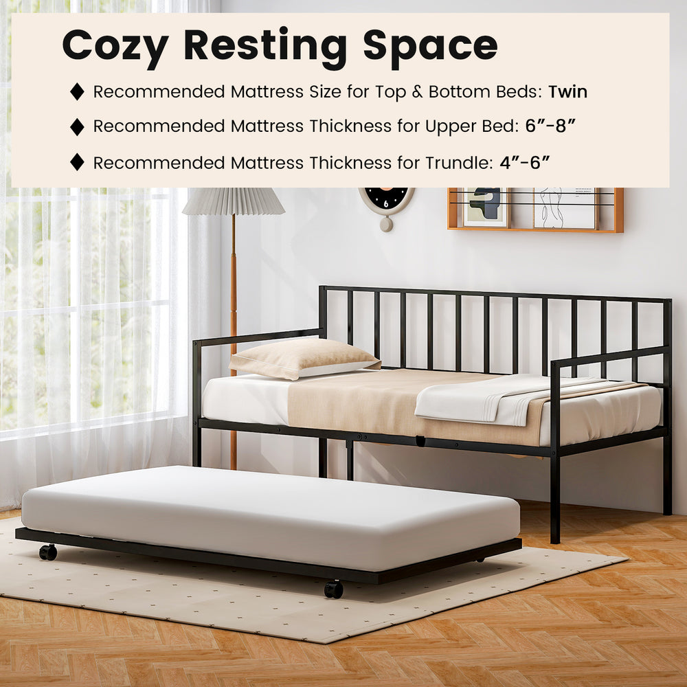 Twin size daybed and trundle frame in black, featuring sturdy metal slats and lockable casters for easy use.