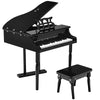 Mini grand piano toy in black with 30 keys and matching bench, ideal for children aged 1 to 7.