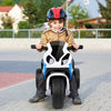 Child riding a blue BMW licensed electric motorcycle with three wheels, designed for safe indoor and outdoor play.