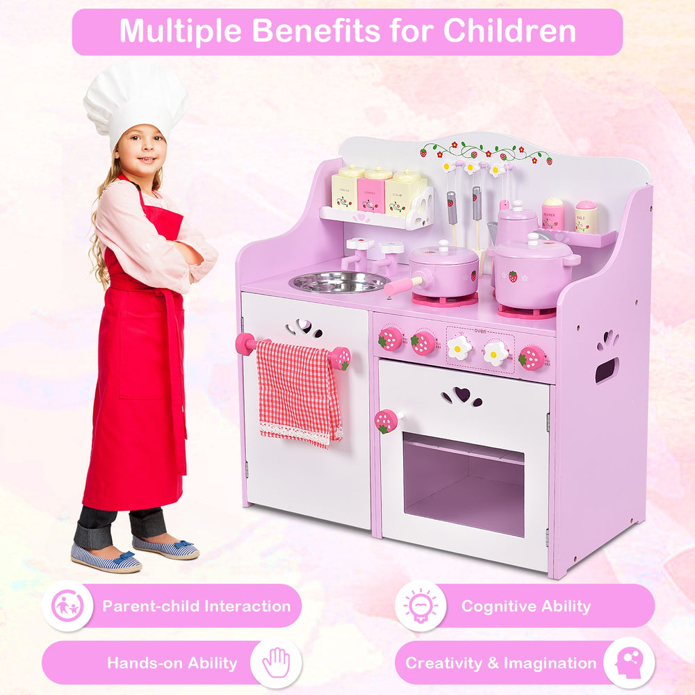 Kids wooden kitchen toy playset in pink with strawberry design, featuring working knobs and storage for pretend cooking.