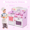 Kids wooden kitchen toy playset in pink with strawberry design, featuring realistic details and storage space for.