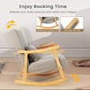 Upholstered rocking chair in gray with rubber wood frame, featuring a padded backrest and lumbar pillow for comfort.