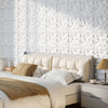 3D white PVC wall panels with diamond accent, perfect for DIY interior decoration in bedrooms or living spaces.