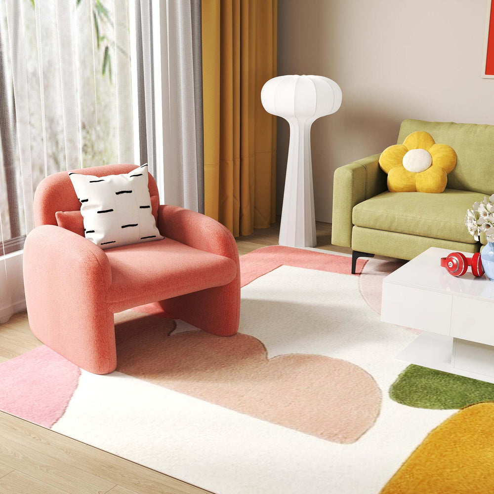Accent chair in soft pink sherpa fabric with ergonomic design, perfect for modern living room comfort and style.