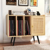 Record player stand with rattan cabinet, featuring storage for vinyl records and charging station for devices.
