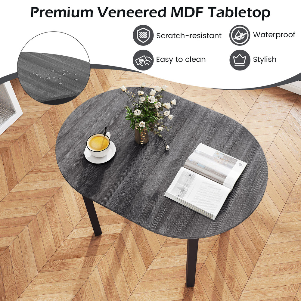 Round 43-inch wooden dining table with black veneer, rubber wood legs, ideal for 2-4 people, stylish and easy to clean.