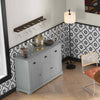 Standing floor lamp with fabric lampshade and sideboard buffet storage in a modern dining room setting.
