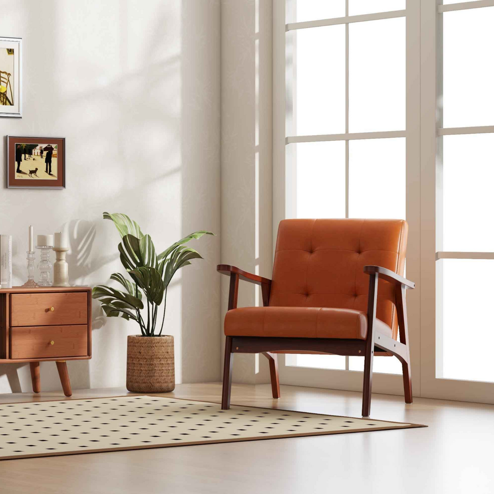 Accent chair in warm orange with wooden frame, featuring a tufted design for stylish living room seating.