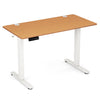 Compact standing desk with bamboo top and white legs, featuring electric lift and memory height settings for small.
