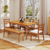 Backless acacia wood bench with cushioned seat, comfortably seating two for outdoor dining and gatherings on the patio.