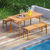 Rectangular acacia wood patio dining set with two benches, perfect for outdoor gatherings by the poolside.