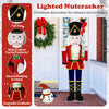 5 FT lighted Christmas nutcracker decoration with glitter sword, tall hat, and waterproof fabric for indoor and outdoor.