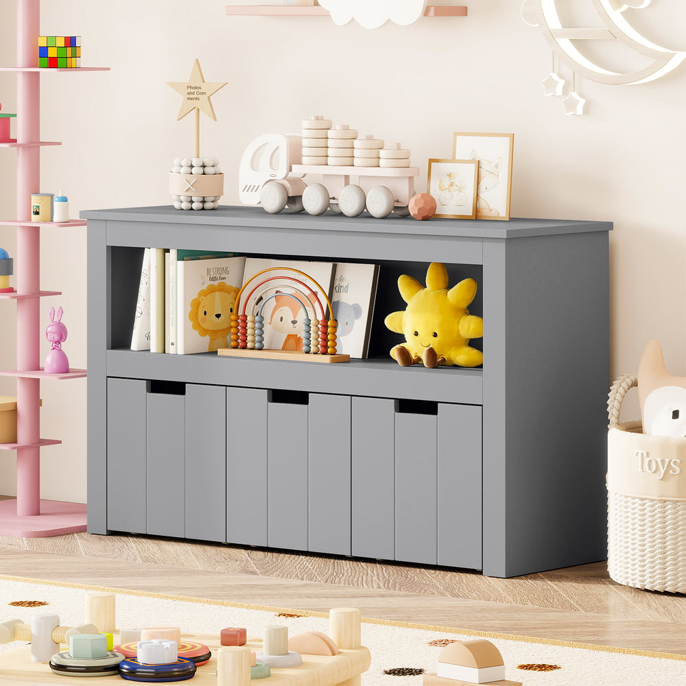 Gray kid toy storage cabinet with three drawers on wheels, offering large storage space for a tidy room.