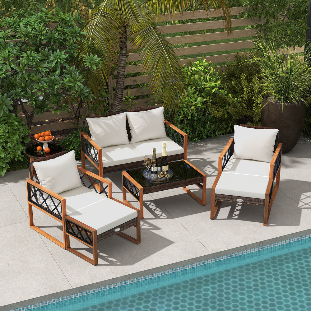 Patio furniture set featuring PE wicker and acacia wood, with soft cushions, ideal for outdoor relaxation by the.