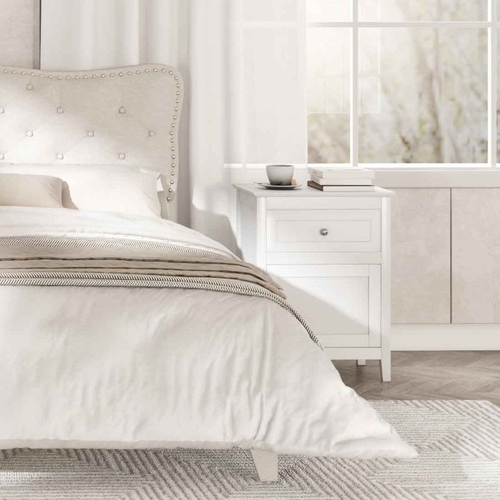 Nightstand with drawer and shelf in elegant curved design, perfect for bedside organization in a stylish bedroom.