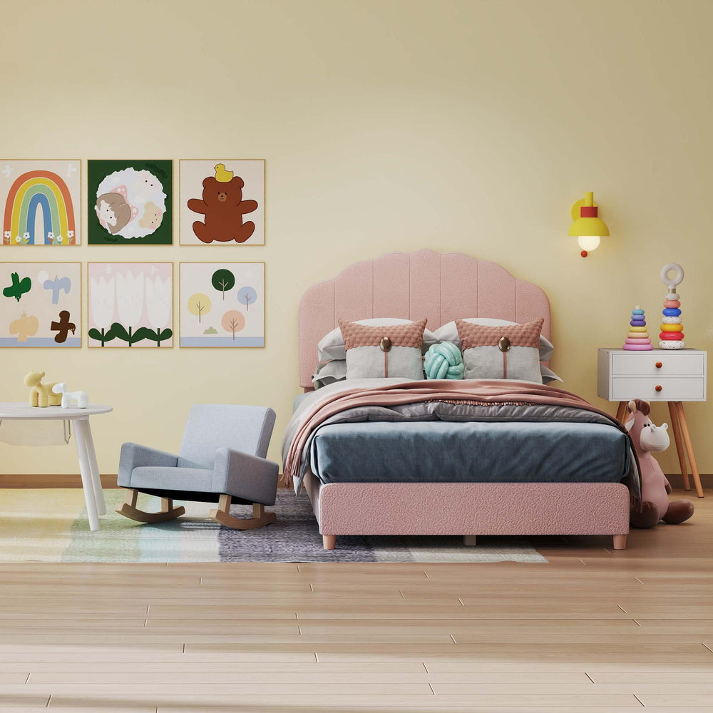 Twin pink bed with blue and pink rocking chairs and white nightstand in a stylish children's room setting.
