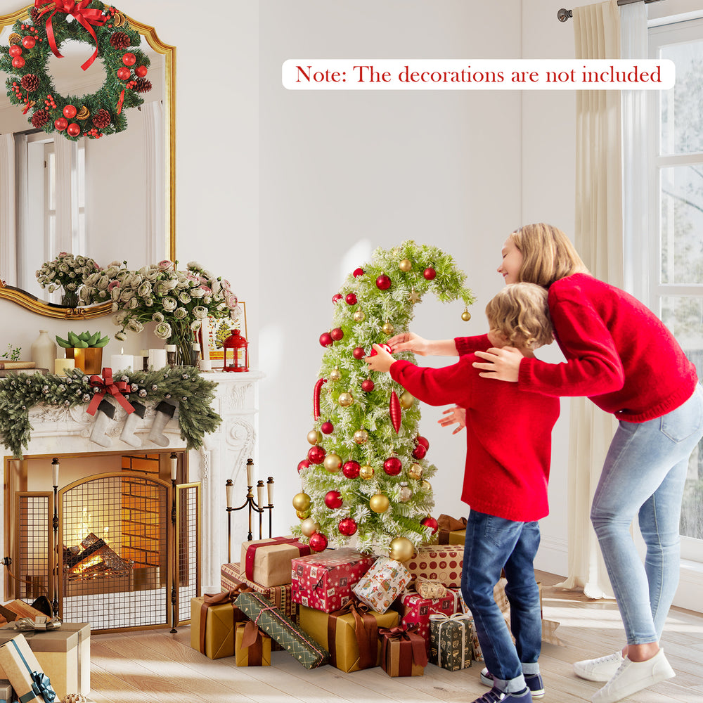 Whimsical 5 FT Christmas tree with bendable top, lush green branches, and warm white LED lights for festive decor.