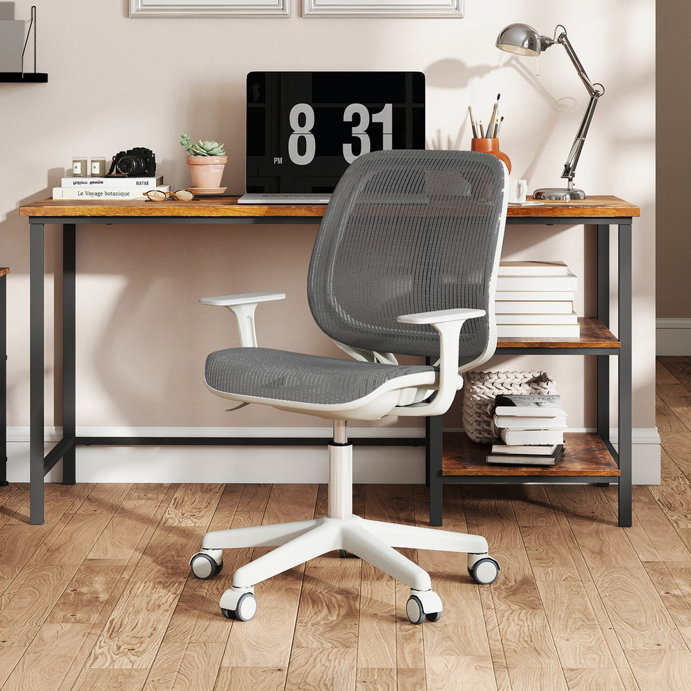 Gray swivel mesh children's computer chair with rounded corners and breathable fabric, ideal for comfortable study.