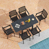 Rectangular aluminum patio table with six stackable armchairs, featuring slatted seats and elegant backrest patterns.