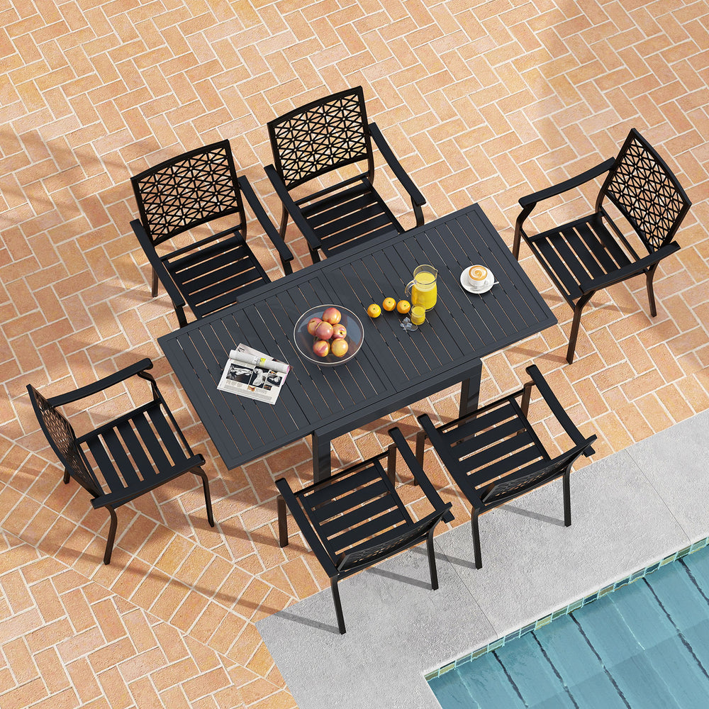 Rectangular aluminum patio table with six stackable armchairs, featuring slatted seats and elegant backrest patterns.