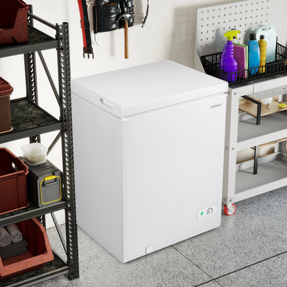 Compact chest freezer with adjustable temperature, removable storage basket, and top stay-open door for easy access.