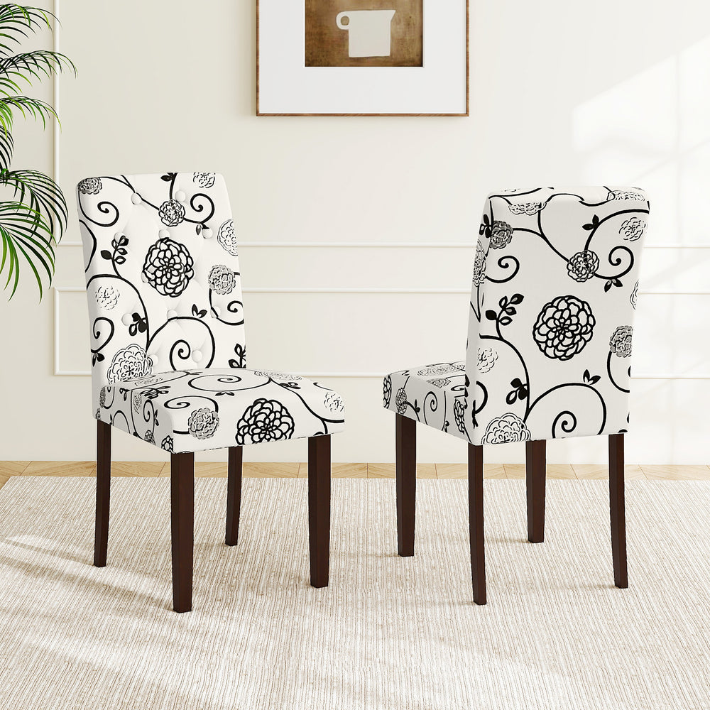Button tufted beige floral dining chairs with high curved backs, featuring sturdy rubber wood legs for comfort and.