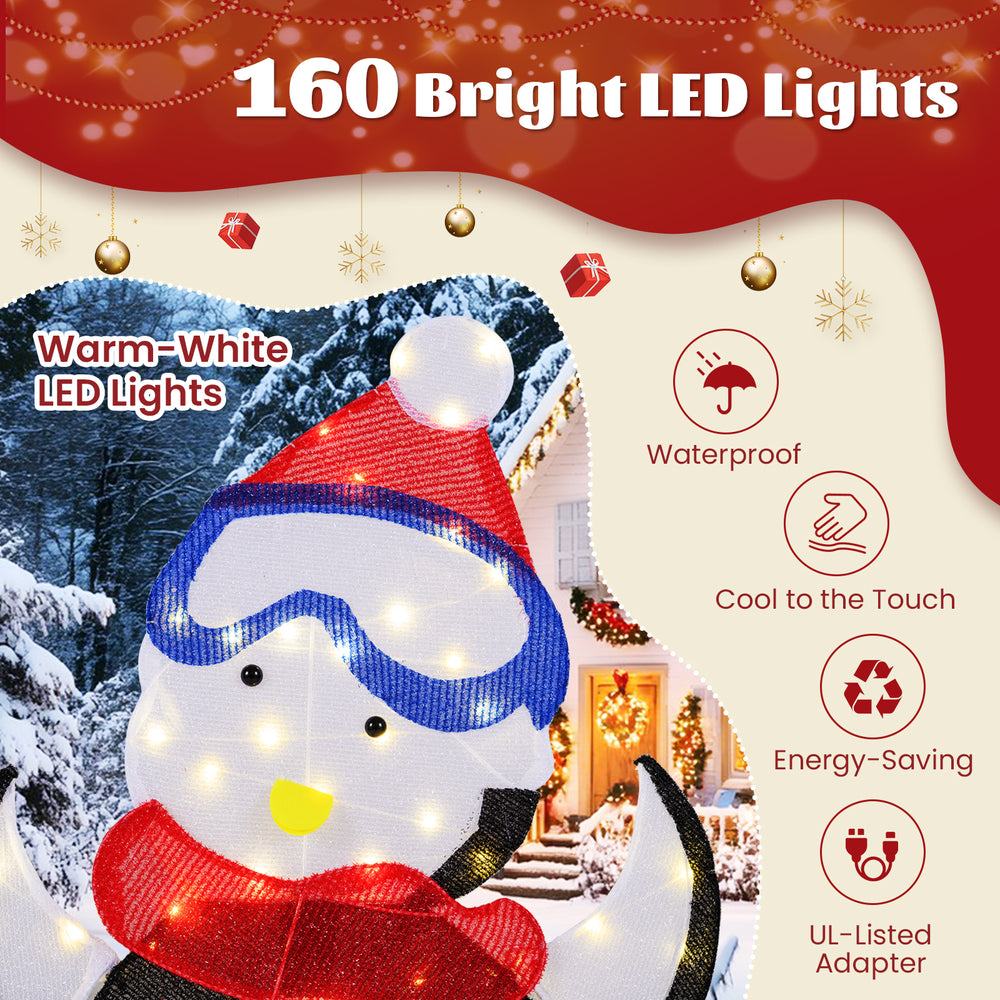 Lighted 2D penguin family Christmas decoration with 160 warm-white LED lights, waterproof and energy-saving for indoor.