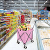Folding shopping utility cart in pink with a water-resistant canvas bag, showcasing groceries in a supermarket aisle.