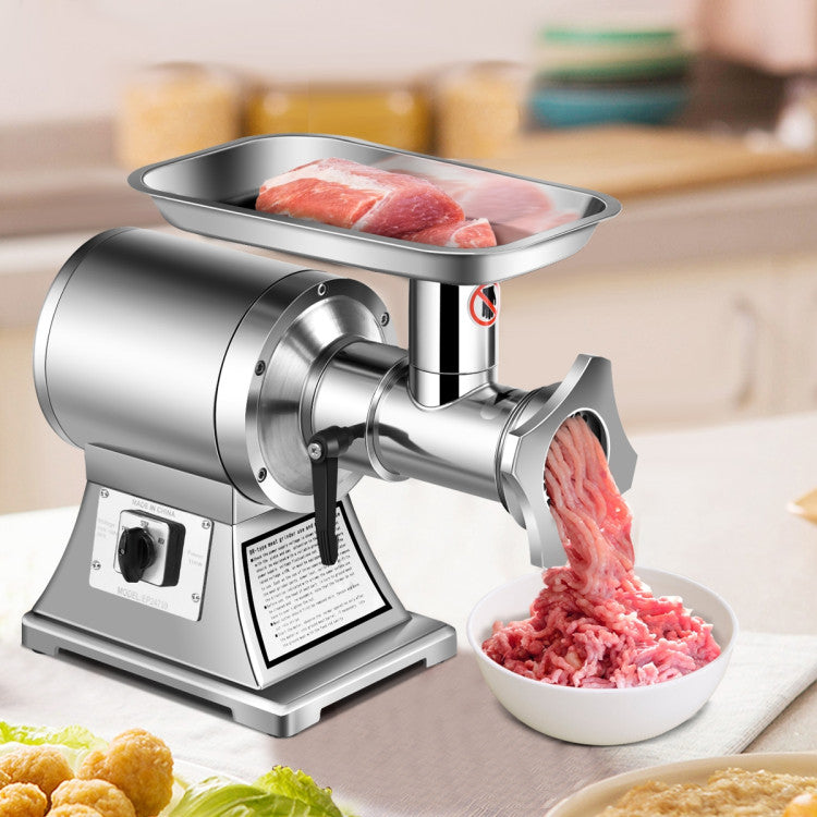 Heavy-duty stainless-steel meat grinder with 1.5HP motor, showcasing meat in the tray for efficient grinding.