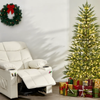Beige kids recliner chair next to a pre-lit 6.5FT Christmas tree with gifts, perfect for cozy holiday gatherings.