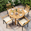 Round acacia wood dining table with metal chairs and cushions, perfect for outdoor patio gatherings.