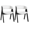 Two upholstered sherpa dining chairs with black rubber wood frames, designed for mid-century modern dining spaces.