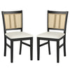 Two farmhouse rattan dining chairs with upholstered seats and solid rubber wood frames, ideal for modern dining spaces.