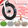 Close-up of the wear-resistant pneumatic tire on a 14-inch kids bike, featuring a rubber outer and protective layer.