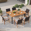 7-piece patio dining set arranged outdoors, showcasing the acacia wood table and stylish armchairs with cushions.