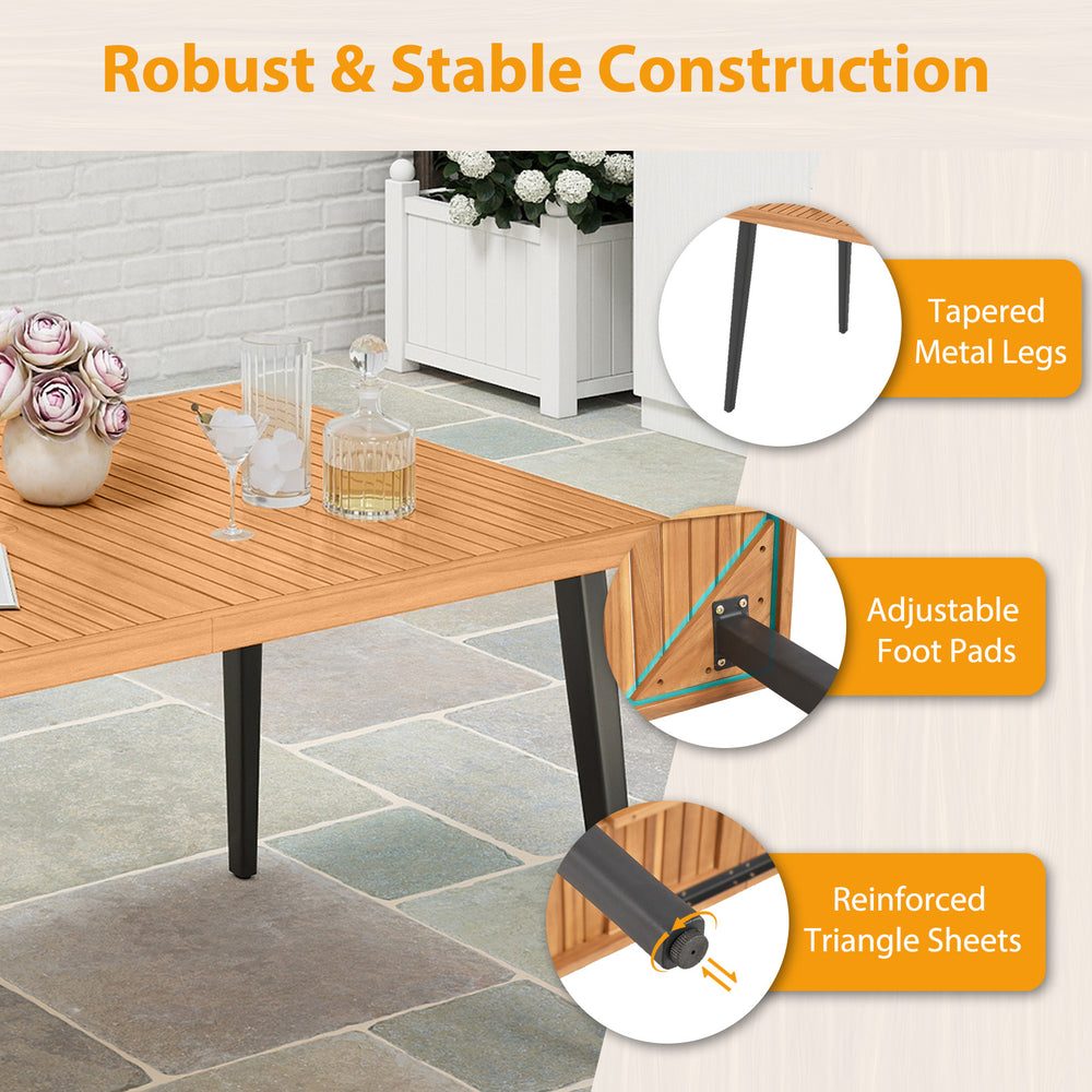 Close-up of the tapered metal legs and adjustable foot pads of the 7-piece acacia wood patio dining set for stability.