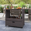 Outdoor wicker bar cart table with tempered glass top, featuring a spacious shelf and drawer, ideal for patio or garden.