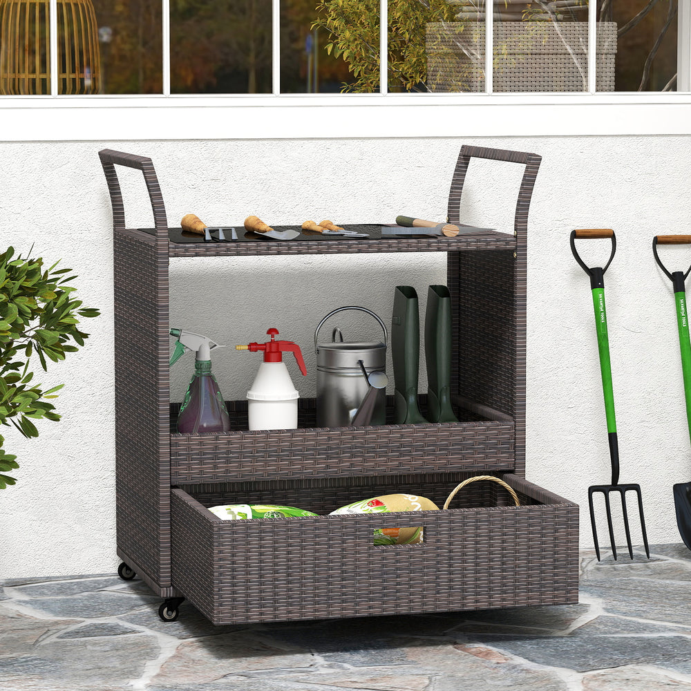 Outdoor wicker bar cart with tempered glass top, featuring ample storage, easy-grip handles, and 4 wheels for mobility.