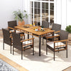 7-piece PE wicker patio dining set featuring a solid acacia wood tabletop and cozy cushions, perfect for outdoor dining.