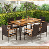 7-piece PE wicker patio dining set with acacia wood tabletop and cozy cushions, perfect for garden and backyard dining.