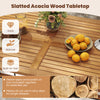 Close-up of slatted acacia wood tabletop from a 7-piece PE wicker patio dining set, showcasing natural beauty and.