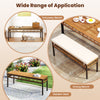 Acacia wood dining bench with soft cushions, ideal for patio or garden seating, featuring a sturdy metal frame.