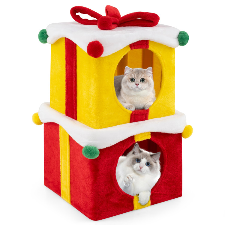 Colorful Christmas-themed cat house with dual openings, featuring two cozy condos for cats to relax and play.
