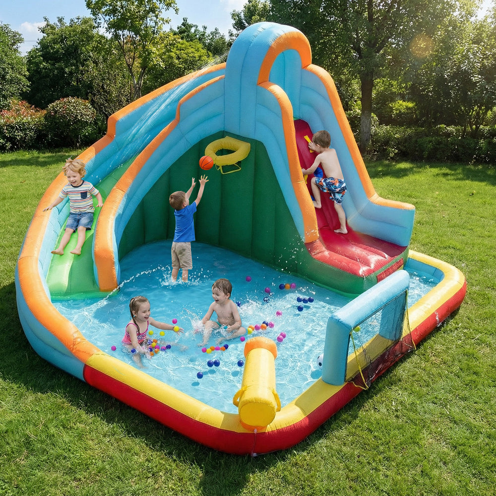 Colorful inflatable water slide park with climbing wall, splash pool, and basketball hoop for outdoor fun.