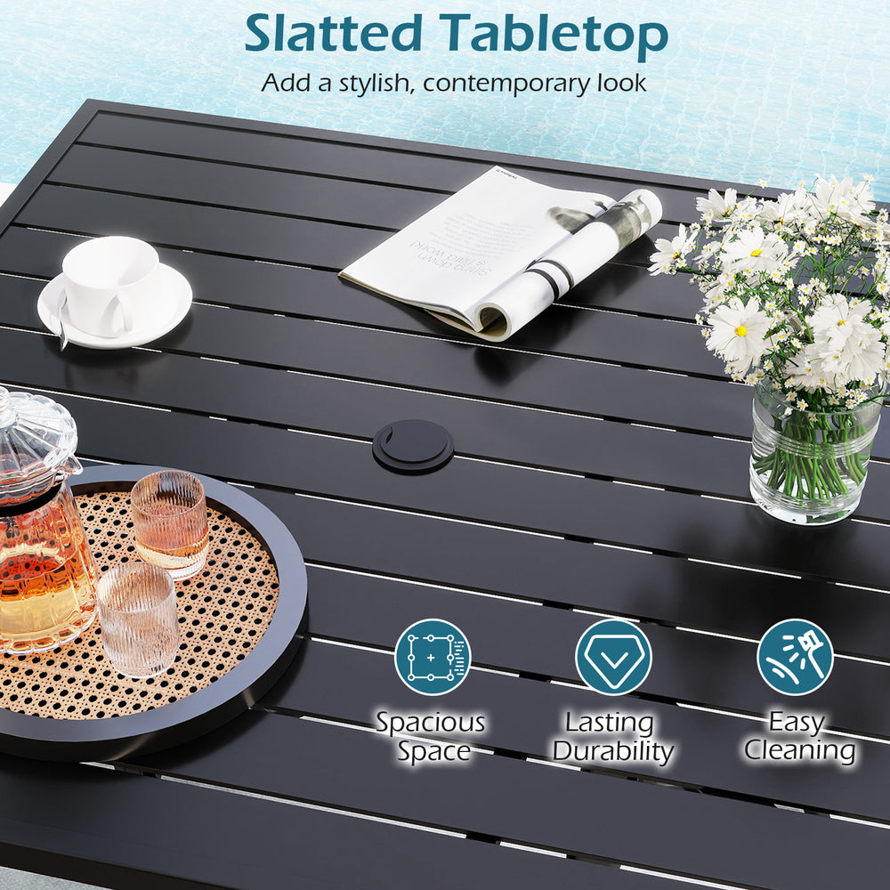 Black slatted tabletop of a 36-inch square patio table, part of a 5-piece outdoor dining set for garden or poolside use.
