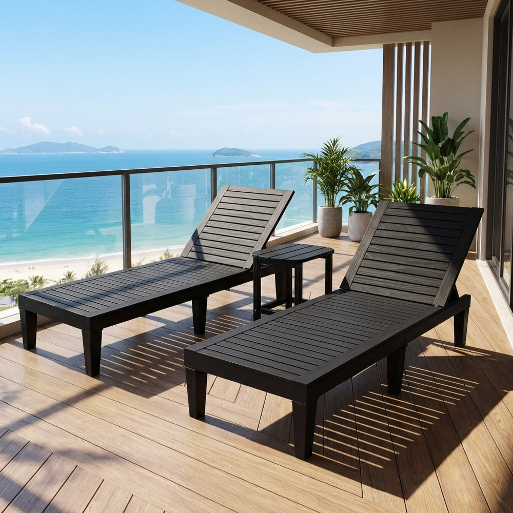 Adjustable chaise lounge set with 2 recliners and side table, perfect for outdoor relaxation on a balcony.